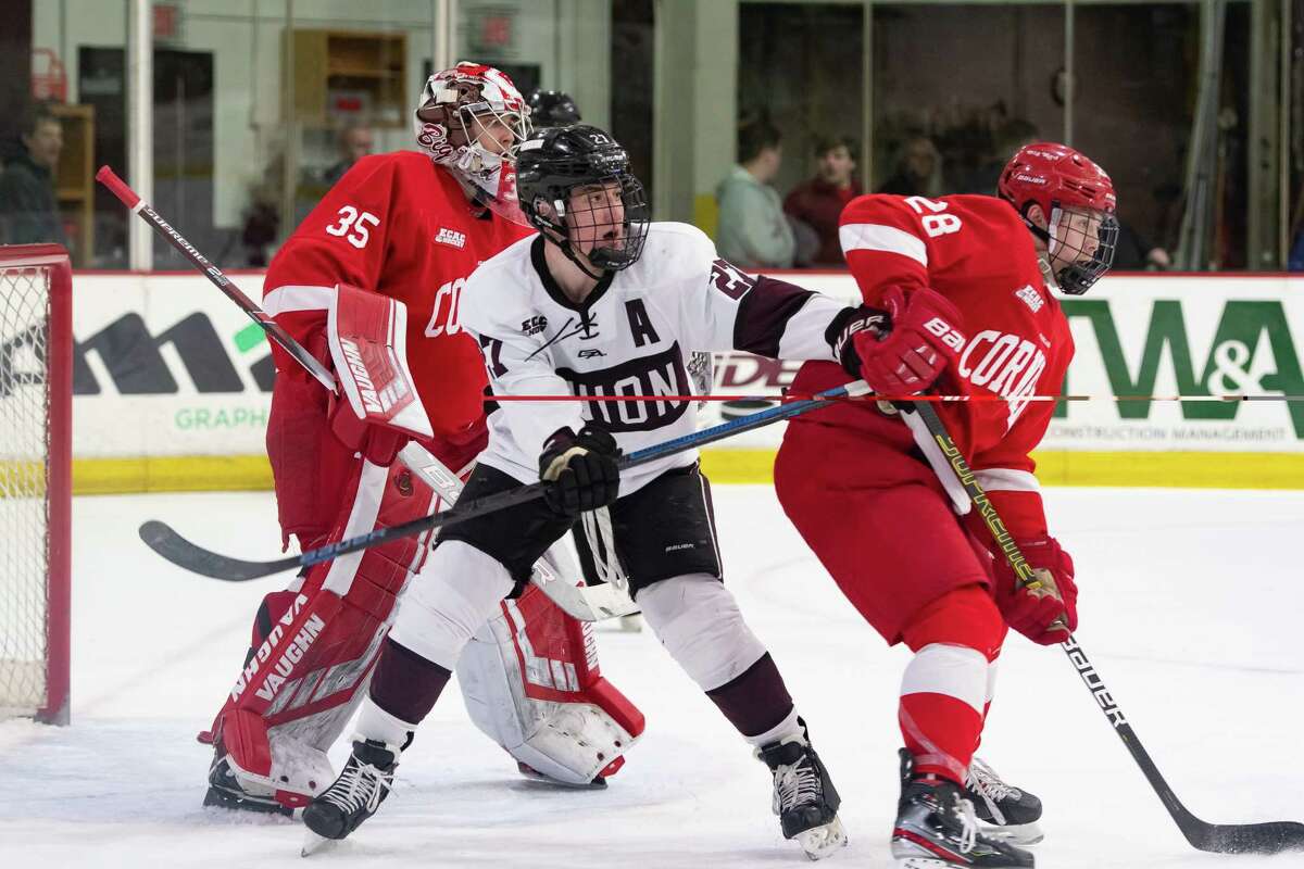 Union senior forward Josh Kosack, center, became on Friday the first player from a Capital Region college or university to win the Hockey Humanitarian Award.