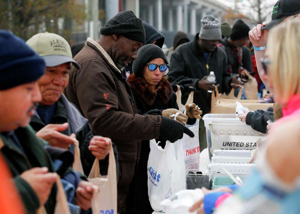 On Sundays, charities flock to feed and clothe Houston’s homeless. What