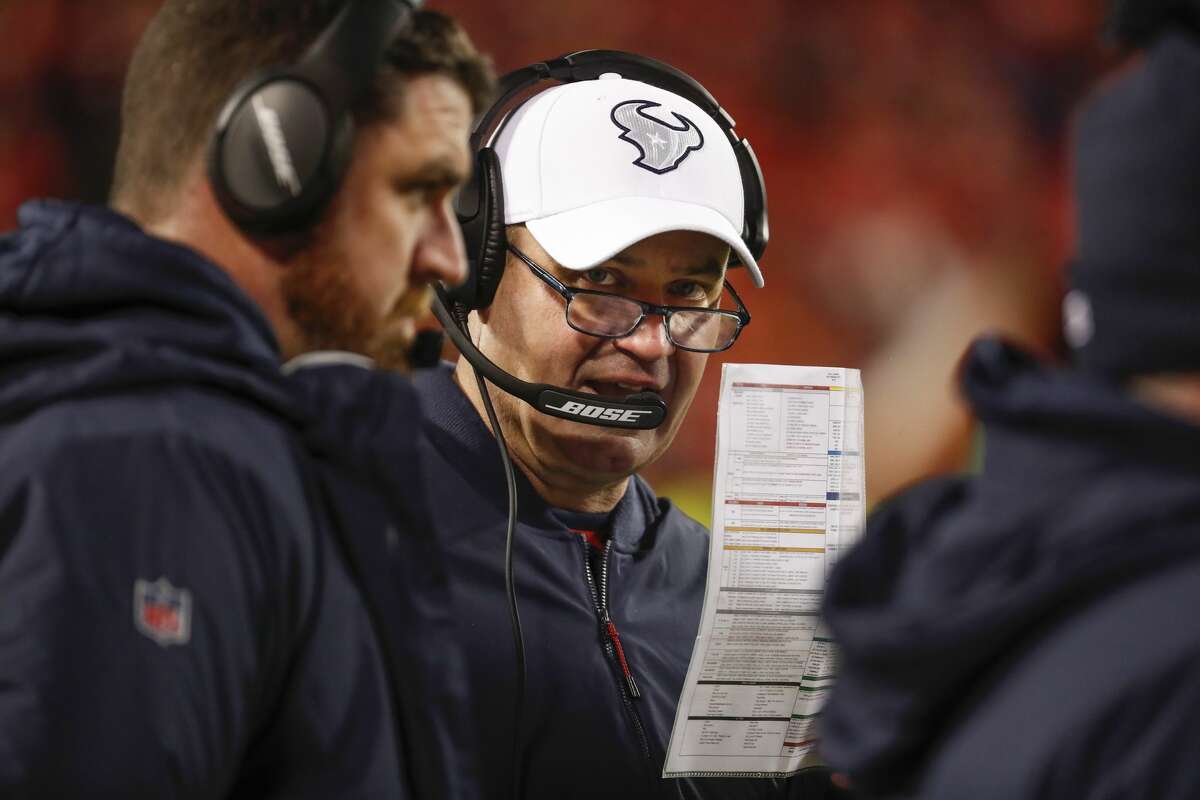 Houston Texans head coach Bill O'Brien talks to offensive coordinator Tim Kelly during the fourth quarter of an AFC divisional playoff game at Arrowhead Stadium on Sunday, Jan. 12, 2020, in Kansas City, Mo.