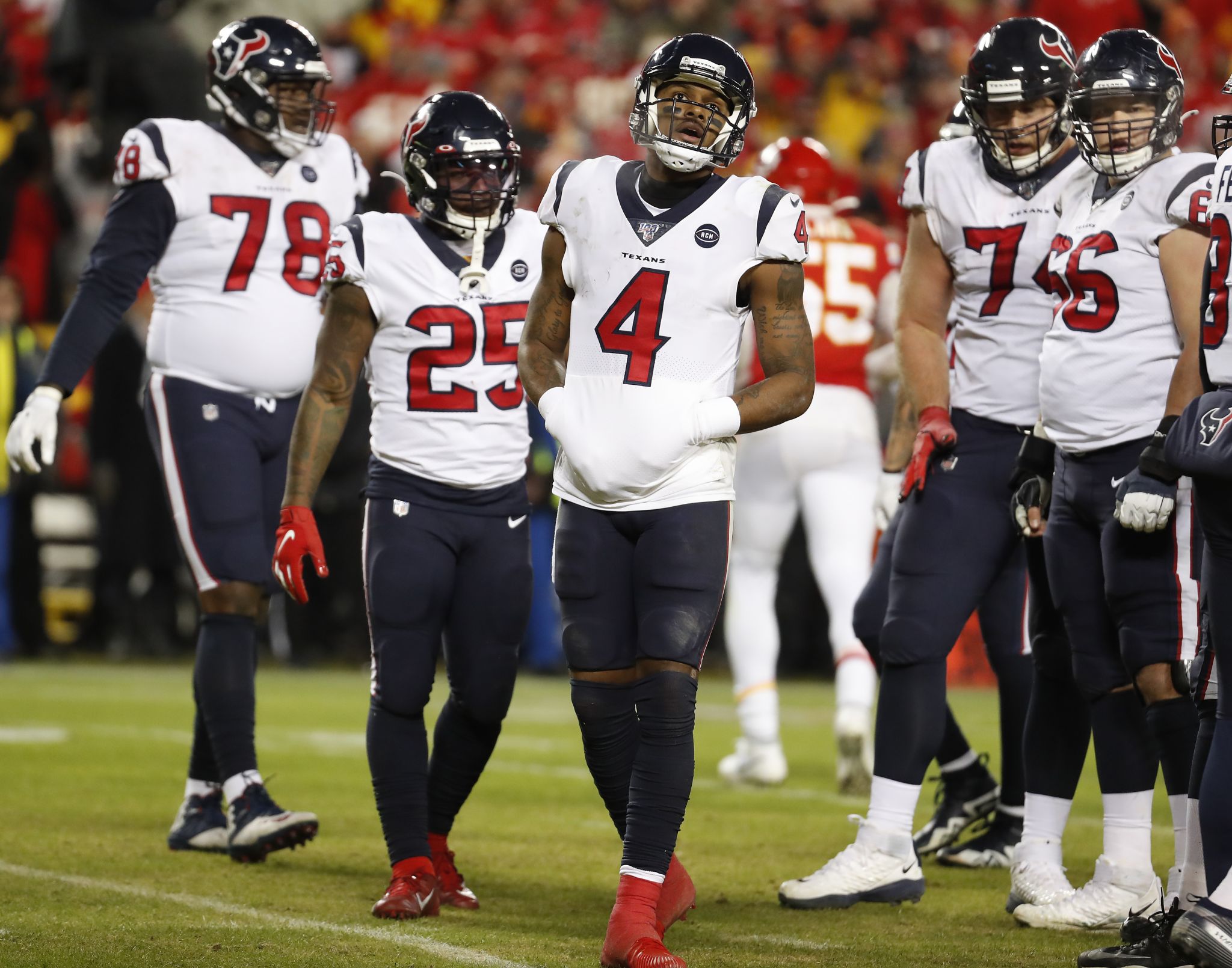 Kansas City, United States. 12th Jan, 2020. Houston Texans quarterback  Deshaun Watson (4) attempts to get away from Kansas City Chiefs strong  safety Tyrann Mathieu (32) during the AFC Divisional Playoff game