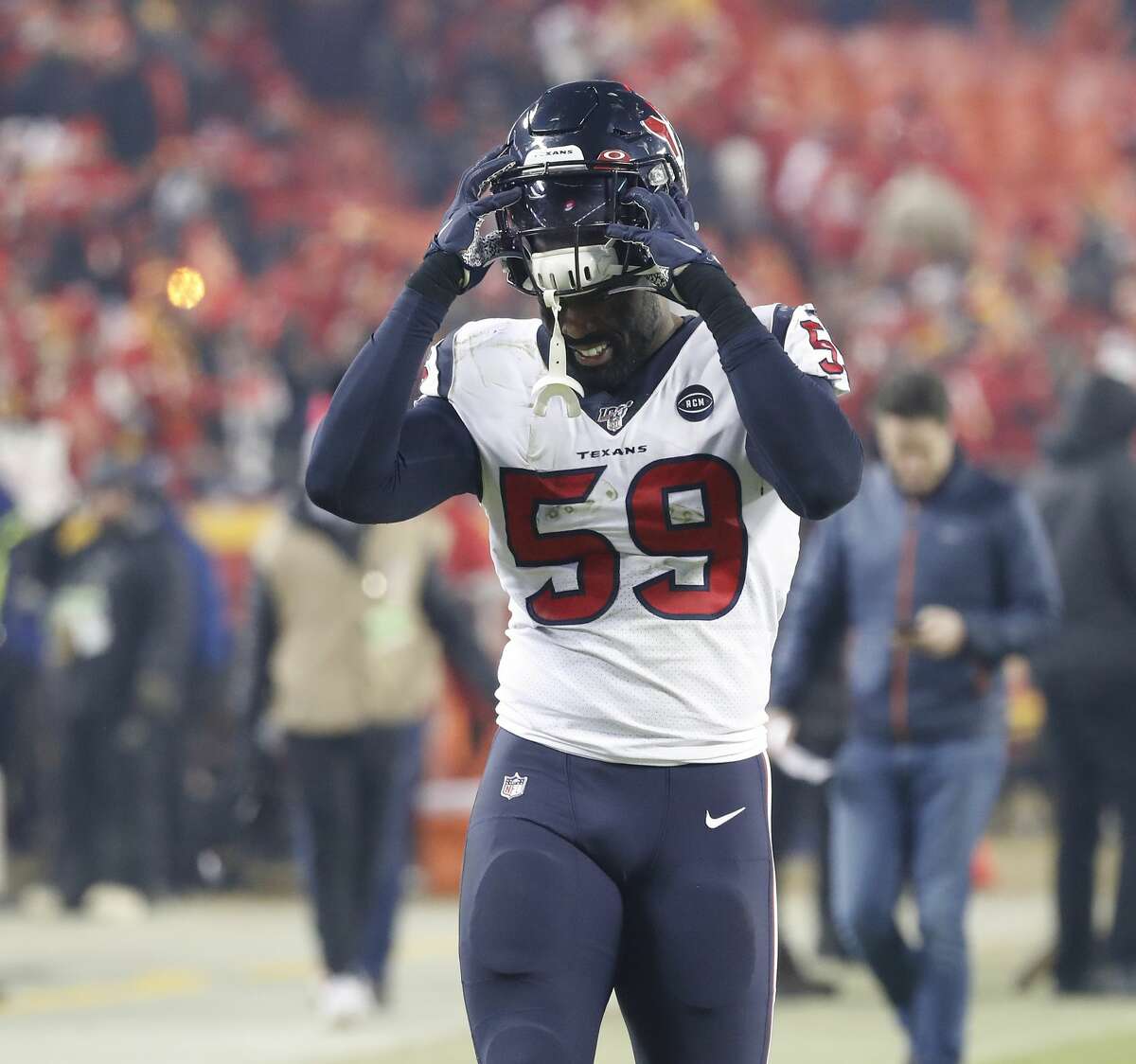 Houston Texans outside linebacker Whitney Mercilus (59) reacts as he walks back to the locker room after the Texans loss to the Kansas City Chiefs during an AFC divisional playoff game at Arrowhead Stadium on Sunday, Jan. 12, 2020, in Kansas City, Mo.