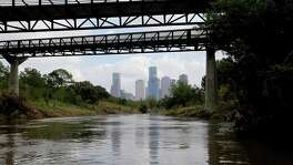 The Houston skyline as seen while canoeing down the Buffalo Bayou at Buffalo Bayou Park with Bayou City Adventures on a tour which originates at Lost Lake on Wednesday, Nov. 4, 2015, in Houston. ( Elizabeth Conley / Houston Chronicle )