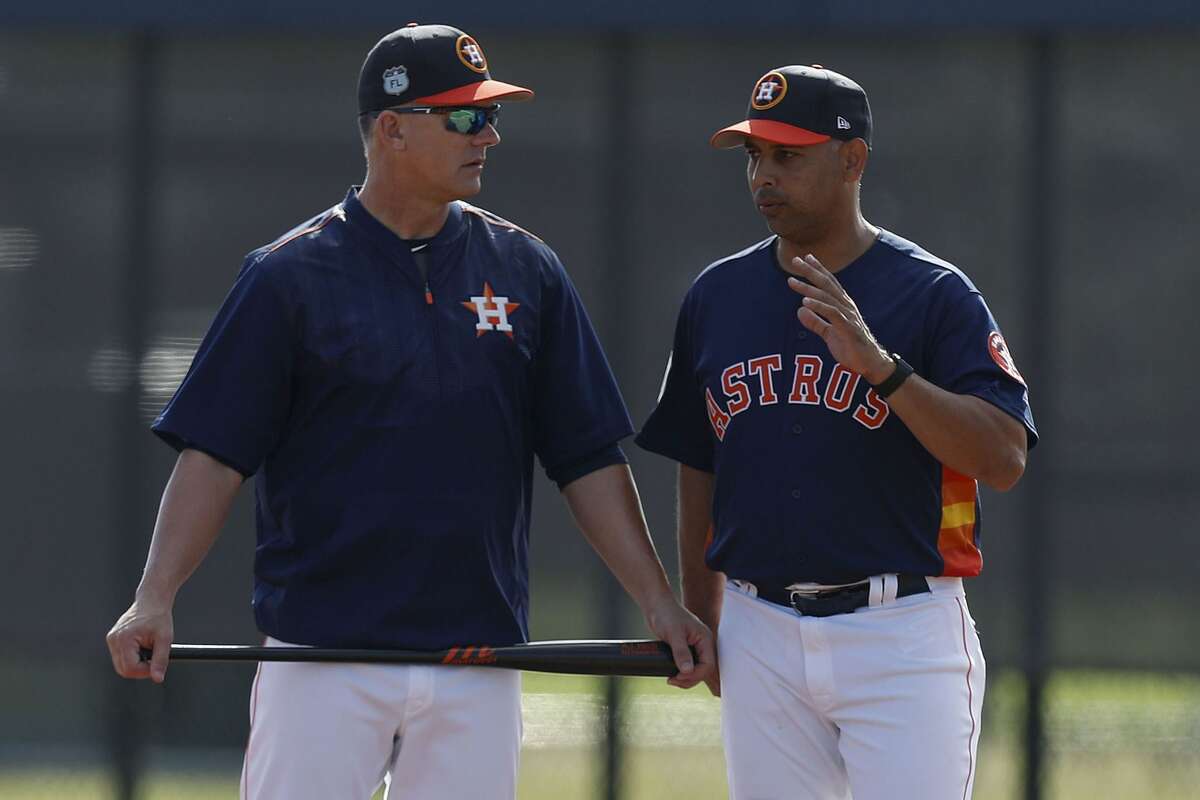Astros manager A.J. Hinch (left) was suspended for a year while former bench coach and current Red Sox skipper Alex Cora's discipline is still be determined by MLB commissioner Rob Manfred.