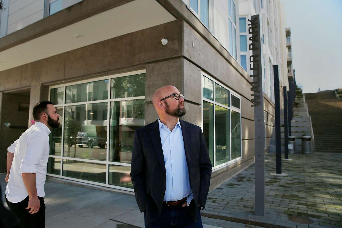 Supervisor Rafael Mandelman stands next to the Openhouse Community building. Openhouse will oversee a housing project bringing 100 units to San Francisco’s District 8.
