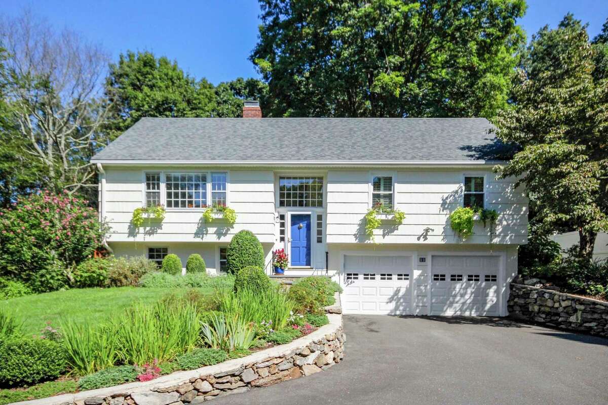 on-the-market-raised-ranch-along-lee-pond-in-westport