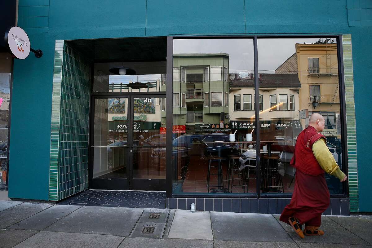 A pedestrian walks past Mamahuhu on Clement Street on Monday, January 13, 2020 in San Francisco, Calif.