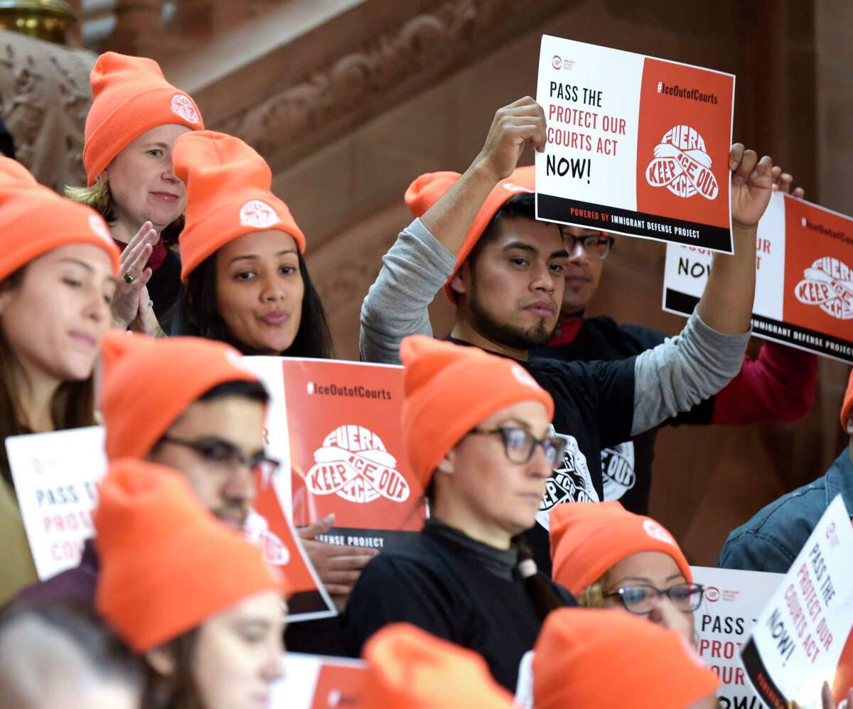 Undocumented immigrants and their supporters take part in a rally at the Capitol on Tuesday, Jan. 14, 2020, in Albany, N.Y. The rally was organized by the Immigrant Defense Project, and those attending the rally were calling on legislators to pass the Protect Our Courts Act. (Paul Buckowski/Times Union)