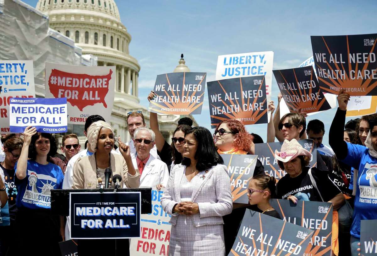 U.S. Reps. Ilhan Omar, left, and Pramila Jayapal speak in support of the Medicare for All Act of 2019 outside the House in June. A reader makes the point that the cost of not having health care may be someone’s life.