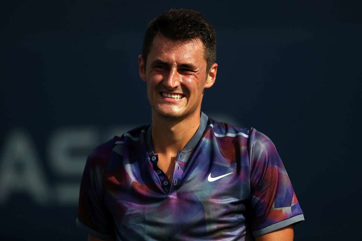 NEW YORK, NY - AUGUST 28: Bernard Tomic of Australia reacts during his first round Men's Singles match against Gilles Muller of Luxembourg on Day One of the 2017 US Open at the USTA Billie Jean King National Tennis Center on August 28, 2017 in the Flushing neighborhood of the Queens borough of New York City. (Photo by Clive Brunskill/Getty Images) ORG XMIT: 700042999