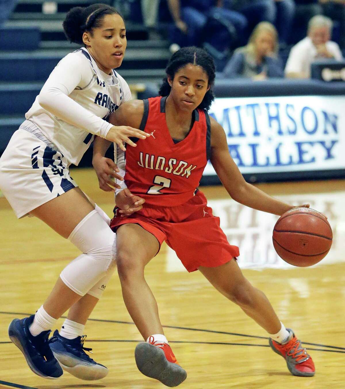 Rocket guard Teanna Huggins moves to the key against Torrie Palomino as the Smithson Valley girls host the Judson Rockets in girls basketball on Jan. 14, 2020.