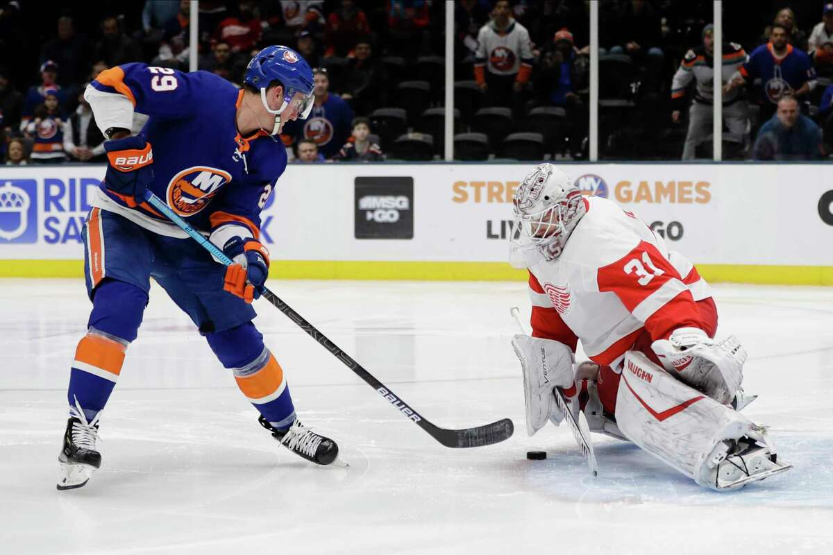 New York Islanders' Brock Nelson (29) shoots the puck past Detroit Red Wings' goal tender Calvin Pickard (31) during the second period of an NHL hockey game Tuesday, Jan. 14, 2020, in Uniondale, N.Y. (AP Photo/Frank Franklin II)