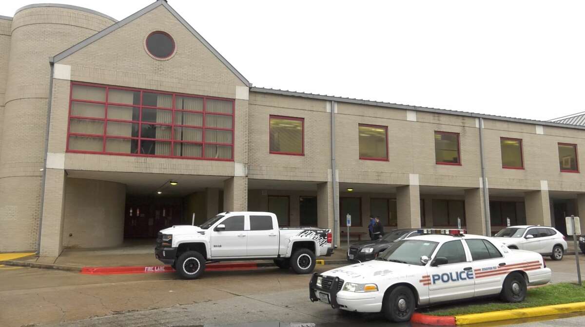 Teachers and staff return to Bellaire High School on Wednesday, Jan. 15, 2020, the day after a student was shot and killed at the school.