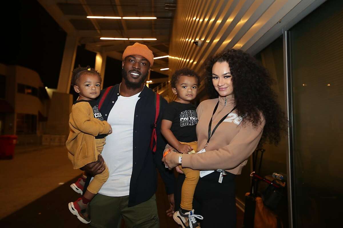 Tevin Coleman with his financee, Ahkeilah Murib, and two-year-old twins, Nazaneen (left), and Nezerah.