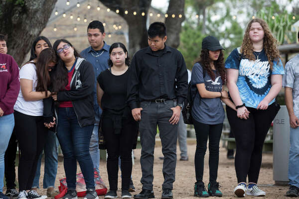 Bellaire High School students and former students gather in a circle to share their memories of the student who was shot and killed yesterday on campus at Evelyn Park on Wednesday, Jan. 15, 2020, in Bellaire. The victim was in the JROTC, and was shot by another JROTC student.