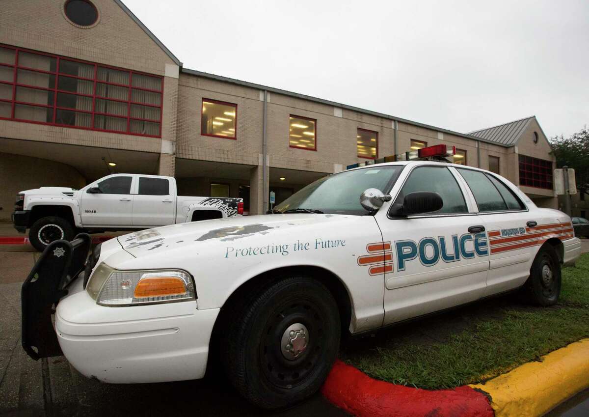 A Houston ISD police car is parked outside Bellaire High School in January, when a student was shot on-campus and later died at the hospital. Several social justice organizations are calling on HISD leaders to disband the district’s police department, arguing students are less safe overall with officers at schools.