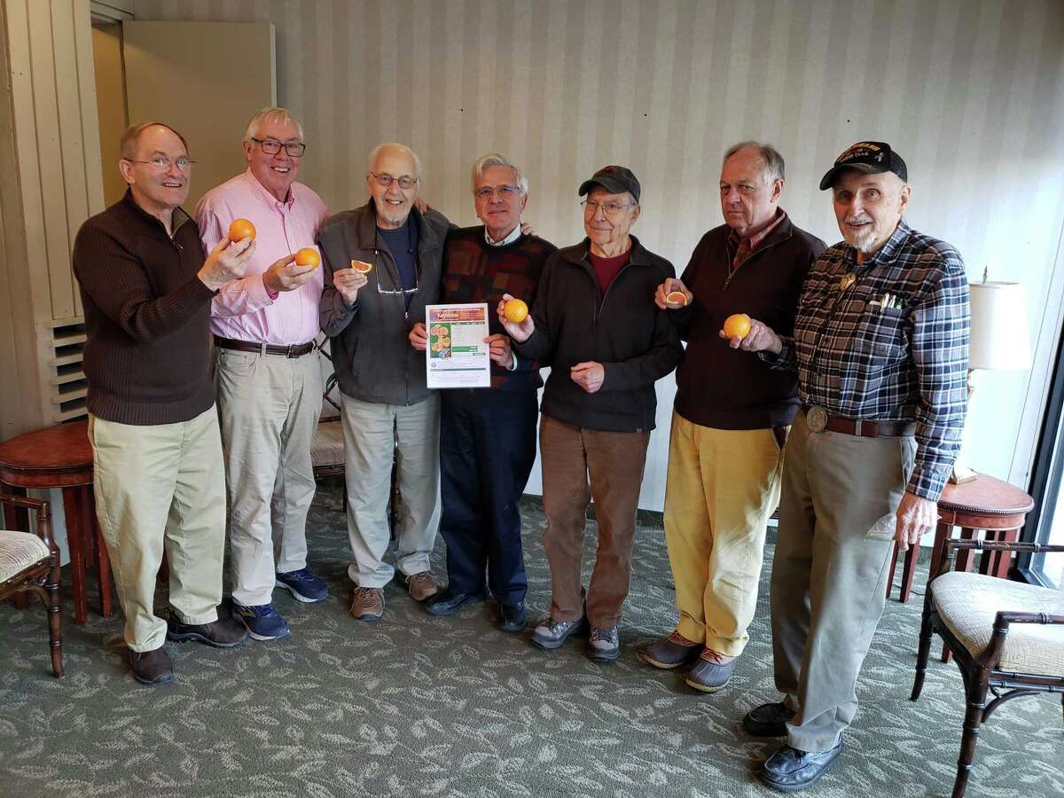 From left, Kiwanians Jerry Sperole, Marty Clancy, Bud Taylor, Bill Brautigam, Dave Hapke, Den Taylor and Fred “Hans” Sindel get ready for the club's annual citrus sale which begins Jan. 20.