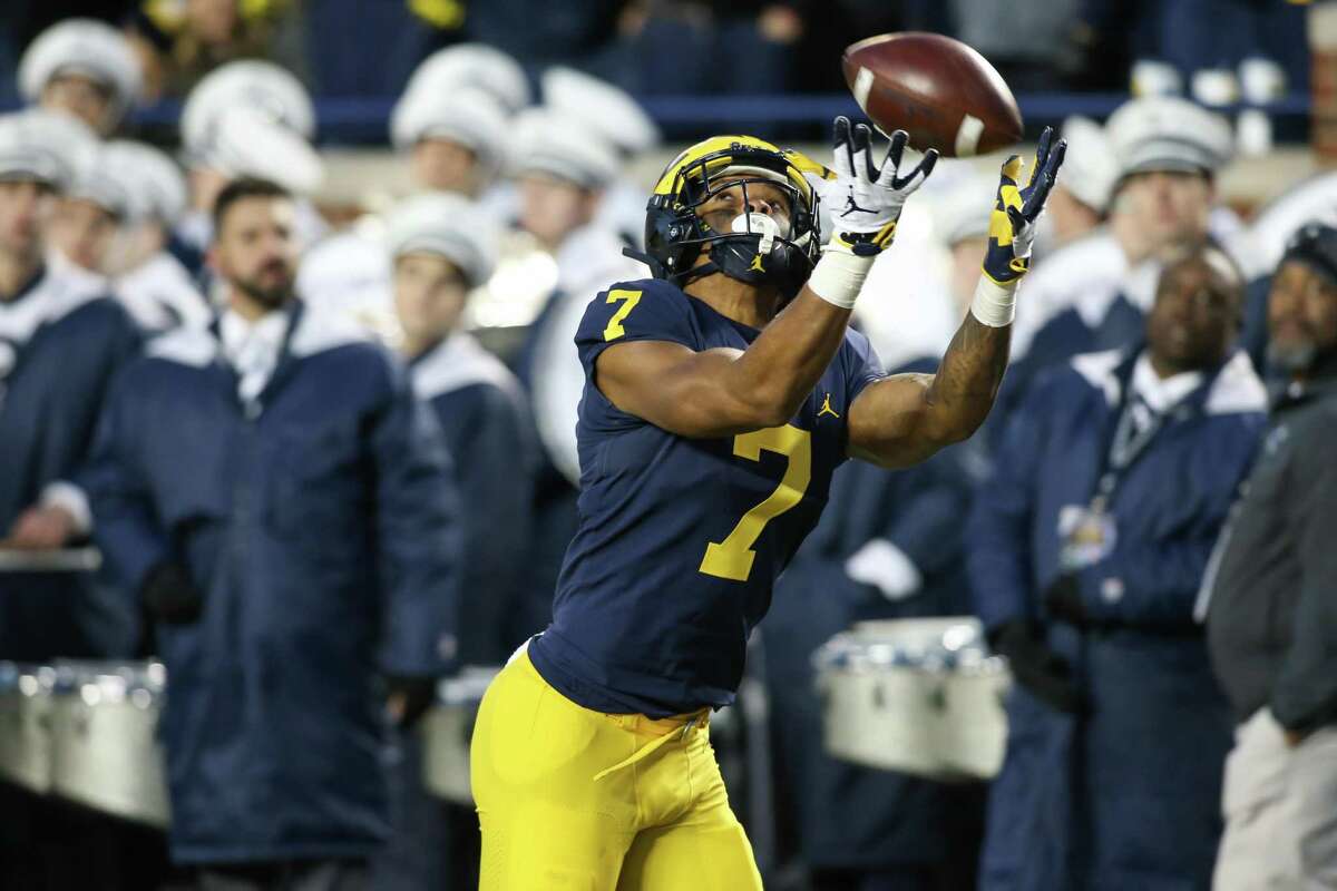 Hamden’s Tarik Black catches a pass in Michigan’s game against Penn State in 2018. Black, now at Texas, was named to the Senior Bowl watch list.