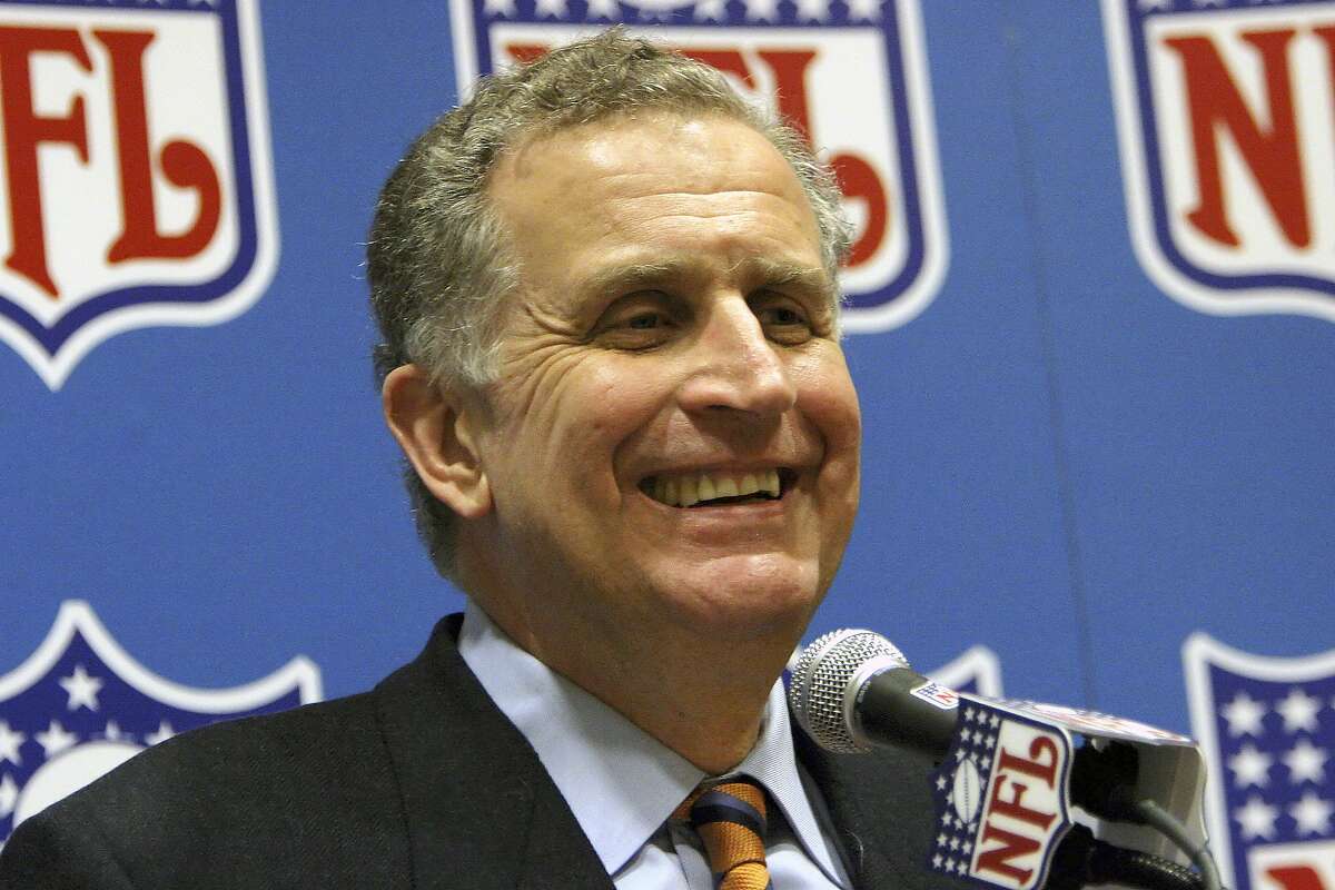 FILE - In this March 8, 2006, file photo, then-NFL Commissioner Paul Tagliabue smiles while addressing the media at an NFL owners meeting in Grapevine, Texas. Former NFL Commissioner Paul Tagliabue has made the Pro Football Hall of Fame in his fifth attempt. Tagliabue and former New York Giants general manager George Young made it as contributors. Ex-Dallas Cowboys safety Cliff Harris and former Cleveland receiver Mac Speedie completed the centennial class announced Wednesday, Jan. 15, 2020. The class of 10 senior candidates, three contributors and two coaches are part of the hall's celebration of the NFL's 100th season. (AP Photo/D.J. Peters, File)