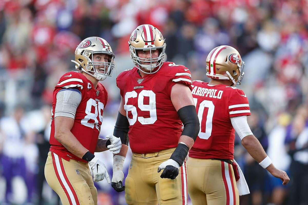 SANTA CLARA, CALIFORNIA - JANUARY 11: George Kittle #85 and Mike McGlinchey #69 of the San Francisco 49ers react after a play in the third quarter of the NFC Divisional Round Playoff game against the Minnesota Vikings at Levi's Stadium on January 11, 2020 in Santa Clara, California. (Photo by Lachlan Cunningham/Getty Images)