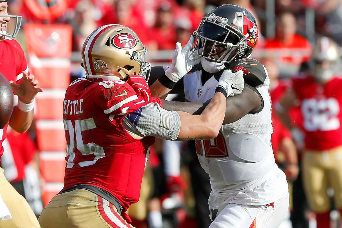 TAMPA, FL - NOV 25: George Kittle (85) of the 49ers blocks Jason Pierre-Paul (90) of the Bucs during the regular season game between the San Francisco 49ers and the Tampa Bay Buccaneers on November 25, 2018 at Raymond James Stadium in Tampa, Florida. (Photo by Cliff Welch/Icon Sportswire via Getty Images)