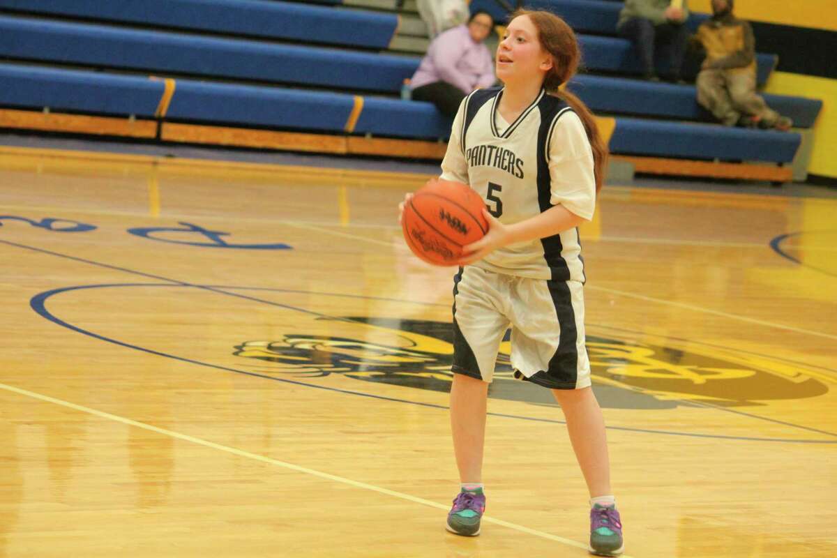 Baldwin's Yesenia Perfitt (5) brings the ball down the court for the Panther middle school team on Monday. (Star photo/John Raffel)