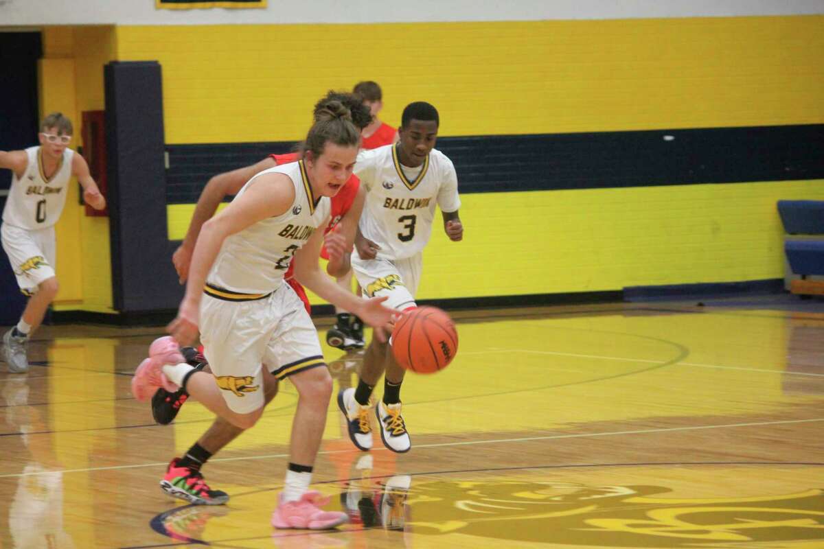 Baldwin's Dexter Hossler heads to the basket during recent action. (Star photo/John Raffel)