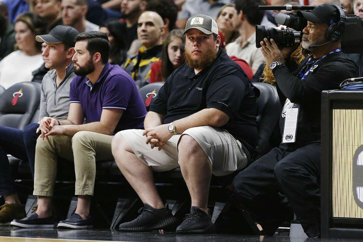 MIAMI, FLORIDA - JANUARY 15: Country music artist Luke Combs attends the game between the Miami Heat and the San Antonio Spurs at American Airlines Arena on January 15, 2020 in Miami, Florida. NOTE TO USER: User expressly acknowledges and agrees that, by downloading and/or using this photograph, user is consenting to the terms and conditions of the Getty Images License Agreement. (Photo by Michael Reaves/Getty Images)