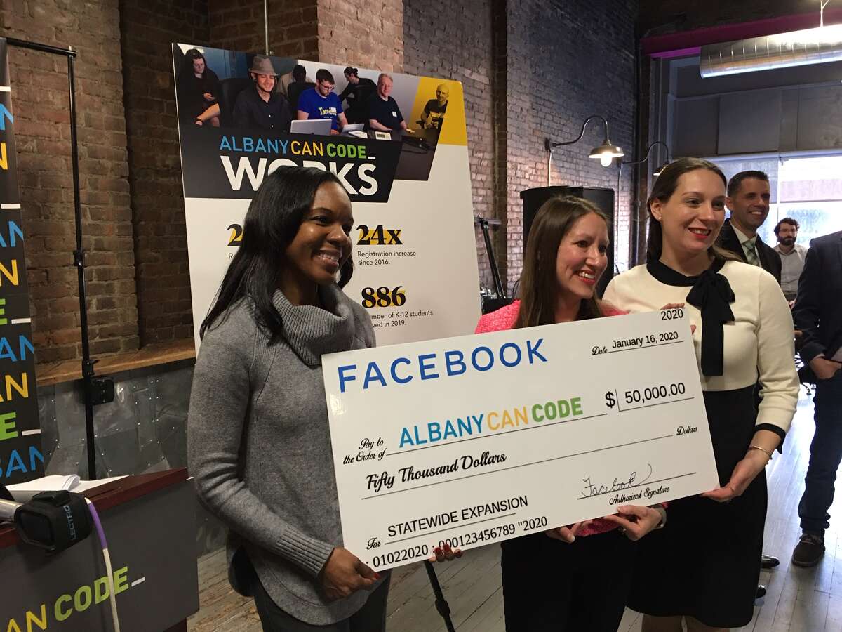 Facebook gave AlbanyCanCode, now known as CanCode Communities, a $50,000 grant to support its expansion back in early 2020. AlbanyCanCode founder Annmarie Lanesey is at center. The program has since scaled up rapidly.