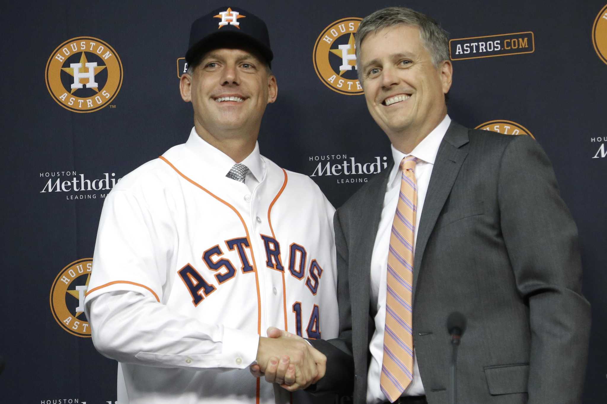 Texas Gov. Abbott poses for pictures with Astros World Series trophy