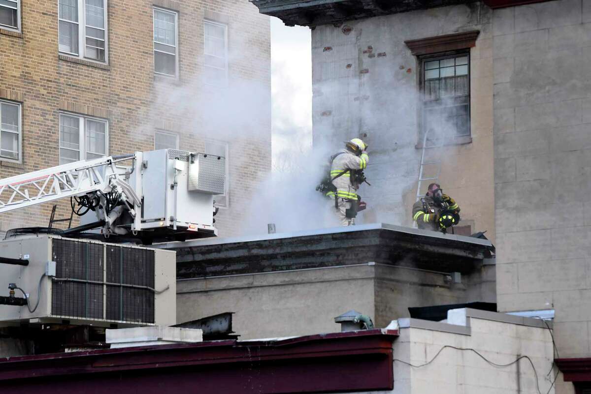 Firefighters work on putting out a fire at the Stockade Inn on Thursday, Jan. 16, 2020 in Schenectady, N.Y. (Lori Van Buren/Times Union)