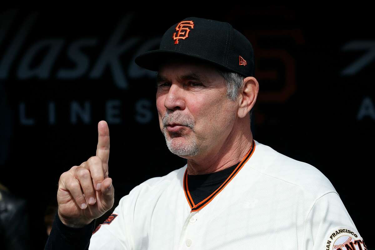 FILE - Manager Bruce Bochy #15 of the San Francisco Giants looks on from the dugout before his last game as Giants manager, the game against the Los Angeles Dodgers at Oracle Park on September 29, 2019 in San Francisco, California.
