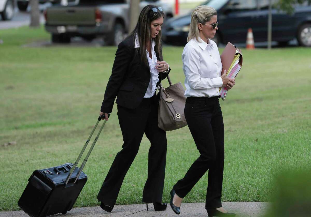 Holly Blakely, then 45, right, arrives at the Federal Courthouse in San Antonio with her lawyer, Robbie Ward, on July 30, 2019 for her sentencing hearing. She had pleaded guilty in February to conspiracy to commit wire fraud involving health care fraud in a scheme that prosecutors said netted her more than $1 million. That sentencing was delayed until Thursday, when Senior U.S. District Judge Fred Biery sent her to prison for 30 months and ordered her to pay $1.7 million in restitution.