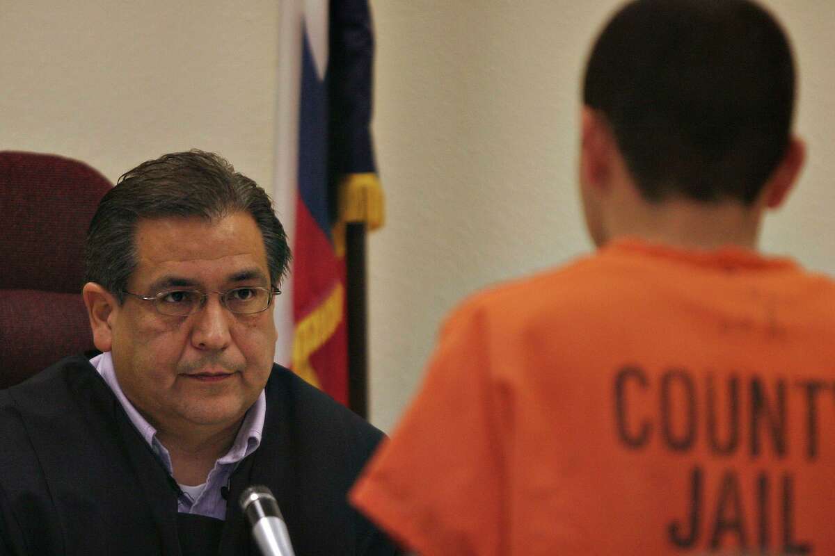 County Court-at-Law Judge Ray Olivarri conducts a weekend court session on Saturday, July 28, 2007. The weekend sessions help inmates with misdemeanors get released sooner, if they’re eligible for bond or to have their charges dismissed. Elected to a state district bench in 2018, Olivarri was known for his compassion and was a strong believer in restorative justice. He died Wednesday of cancer at 64.