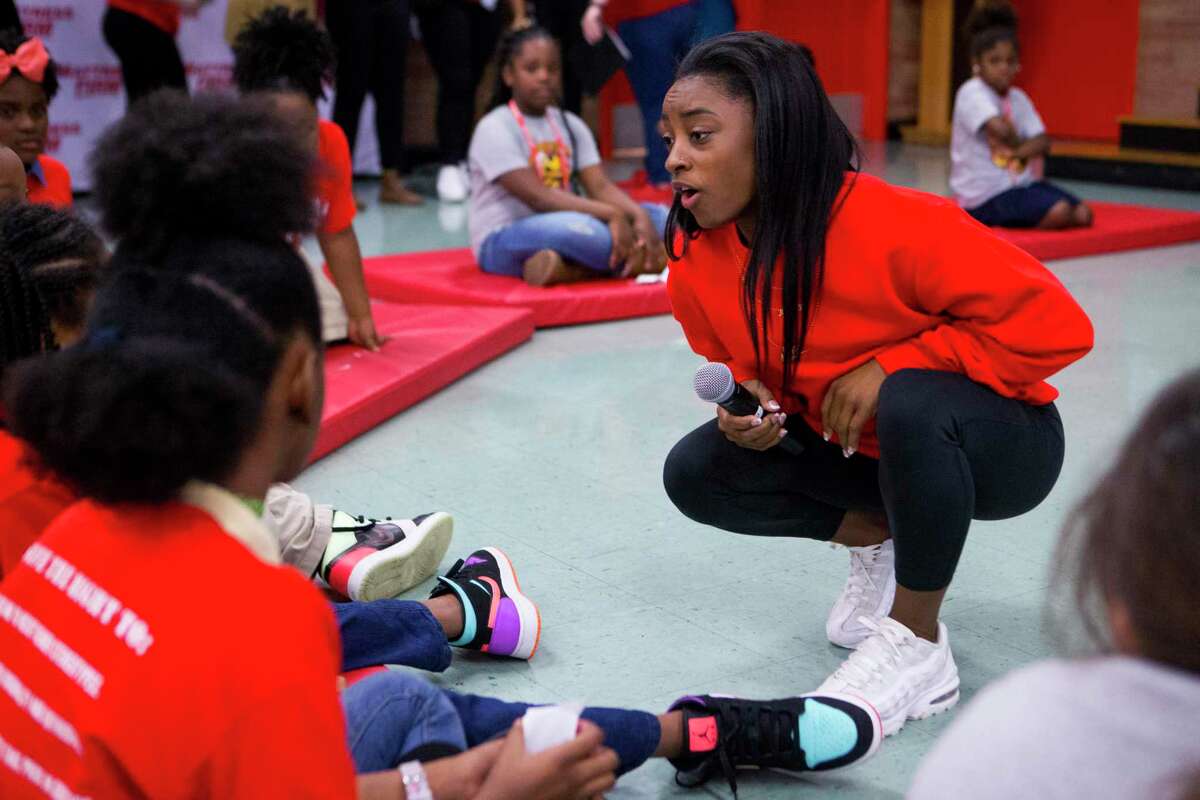 Olympic gold medalist Simone Biles surprises Houston elementary students