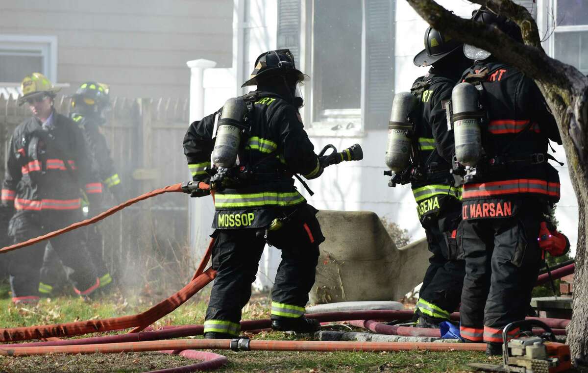 Westport, Norwalk, and Fairfield firefighters battle a blaze Friday, January 17, 2019, on Vani Court in Westport, Conn. The home was unoccupied at the time of the fire.