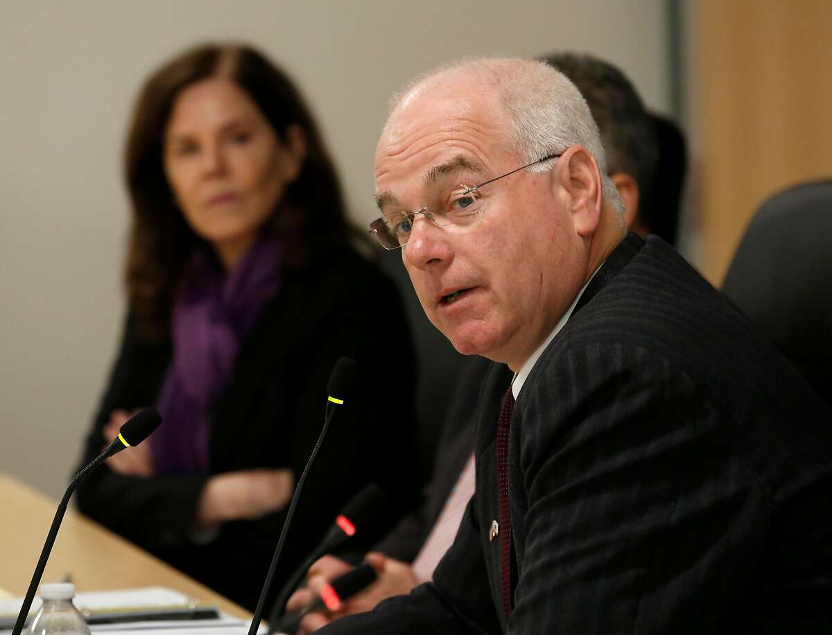 Lenny Mendonca, chairman of the California High-Speed Rail Authority Board of Directors, addresses the board, as board member Nancy Miller, left, looks on during a meeting Tuesday, May 21, 2019, in Sacramento, Calif. California has sued to block the Trump Administration from cancelling nearly $1 billion for the state's high-speed rail project. The lawsuit field Tuesday May 21, 2019 comes after the administration revoked the funding last week. (AP Photo/Rich Pedroncelli)