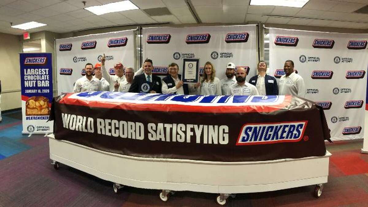 The Mars Wrigley plant in Waco recently unveiled a Snickers bar that measures 24 inches high by 26 inches wide, and weighs more than two metric tons, according to a news release.