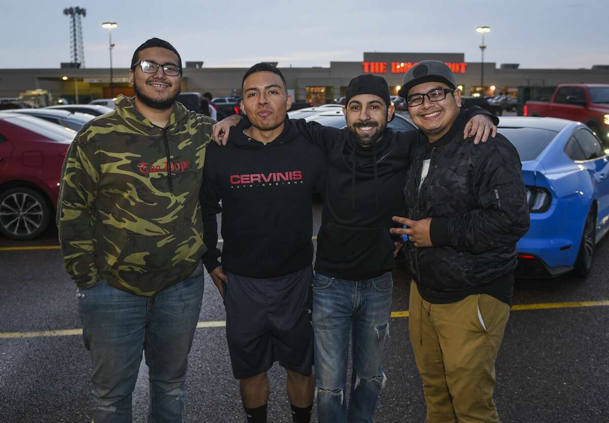 Custom car enthusiasts show up to the Hooters parking lot for the inaugural Hooters Car Show, Friday, Jan. 17, 2020.