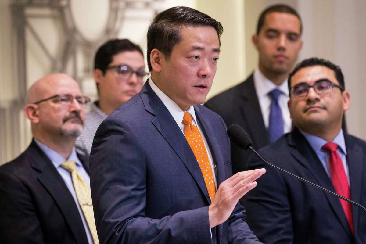 Rep. Gene Wu, standing with other members of the Texas House Democratic Caucus, speaks during a news conference to demand Gov. Greg Abbott to call a special session aimed at limiting gun violence on Wednesday, Sept. 4, 2019, in Houston.