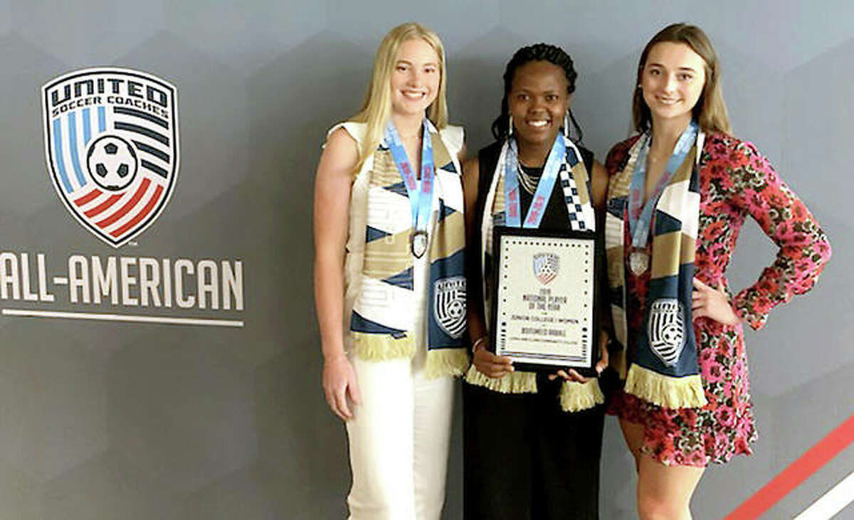 Junior College National Player of the Year Boitumelo Rabale of LCCC, center, is joined by All-America LC teammates Candice Parziani, left and Cassie Hall Saturday at the annual United Soccer Coaches All-America Ceremony and Reception at the United Soccer Coaches Convention in Baltimore.