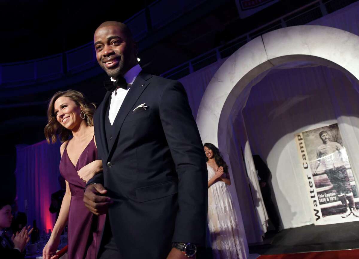 Pro Football Hall of Famer Curtis Martin is introduced at the 53rd Annual Walter Camp Football Foundation Awards Dinner at Yale University on Saturday.