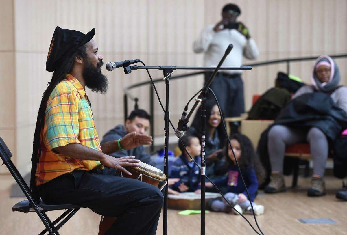 Gammy Moses performs at the Marsh Lecture Hall in the Yale Science Building during the 24th Annual Dr. Martin Luther King, Jr.'s Legacy of Environmental and Social Justice 2020 hosted by the Yale Peabody Museum of Natural History in New Haven on January 19, 2020.