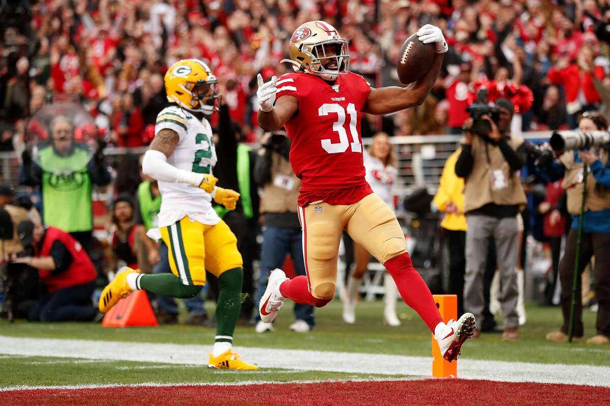 San Francisco 49ers� Raheem Mostert runs for a first quarter touchdown during the NFC Championship game between the San Francisco 49ers and the Green Bay Packers at Levi�s Stadium on Sunday, Jan. 19, 2020 in Santa Clara, Calif.