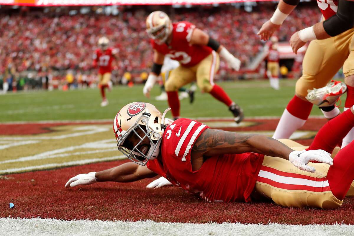 San Francisco 49ers� Raheem Mostert celebrates after scoring a touchdown in the first quarter during the NFC Championship game between the San Francisco 49ers and the Green Bay Packers at Levi�s Stadium on Sunday, Jan. 19, 2020 in Santa Clara, Calif.