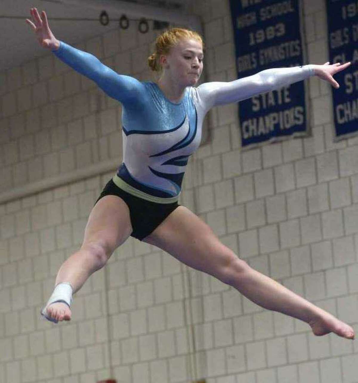 Sarah Collias and the Wilton gymnastics team beat Greenwich to improve their record to 4-1.