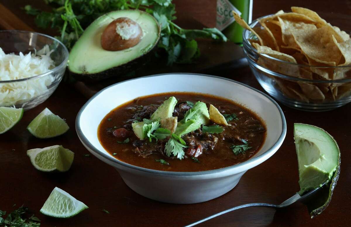 Short rib and flank steak soup sports all the luscious flavors of beefy tacos, but can be made ahead and eaten out of a bowl.