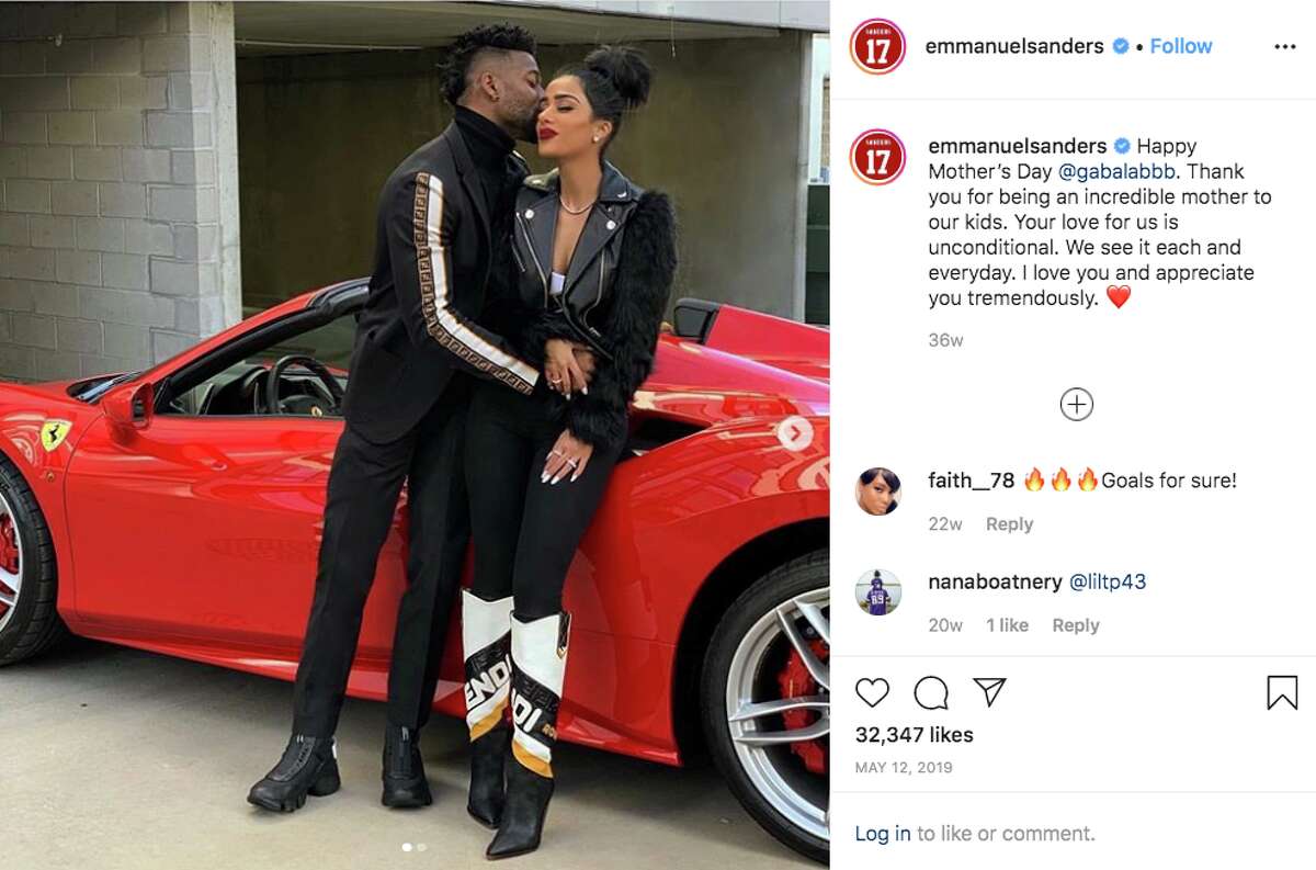 Wide receiver Emmanuel Sanders loves posing in front of his bright red Ferrari.