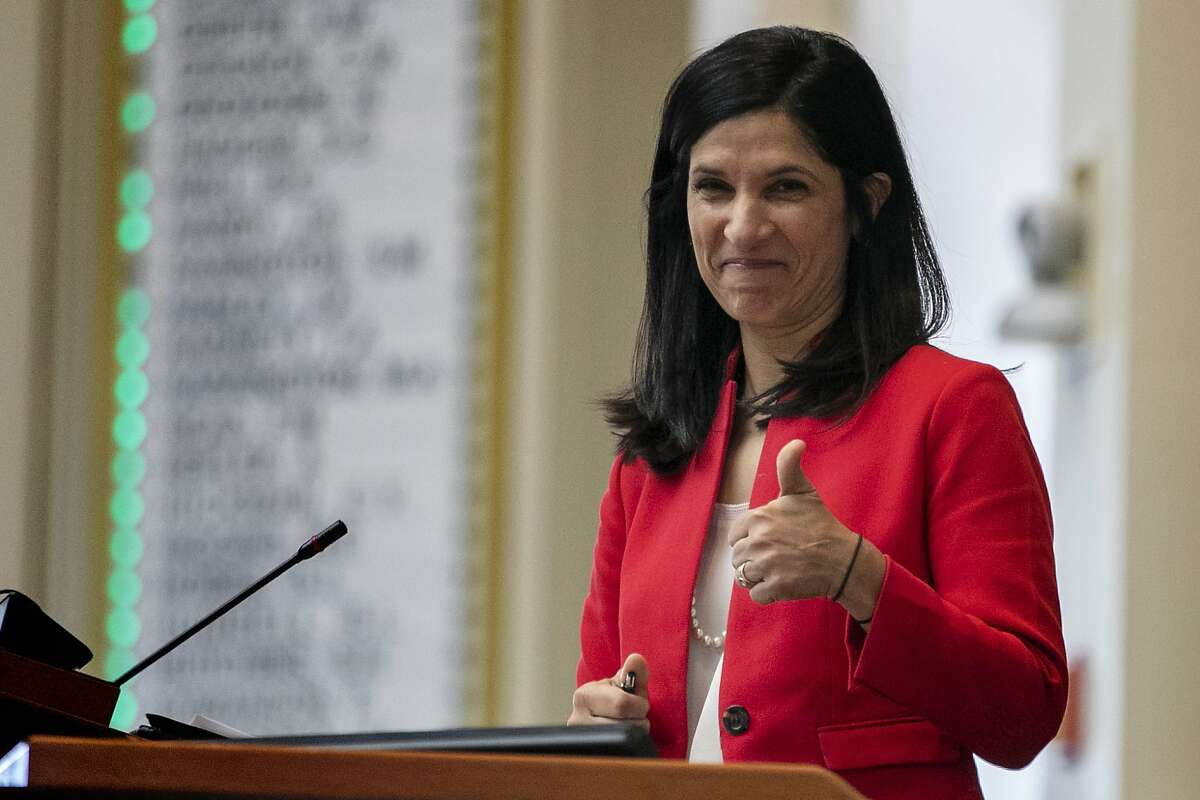 FILE - In this Jan. 8, 2020 file photo, House speaker Sara Gideon, D-Freeport, flashes a thumbs up at a Democratic colleague prior to the start of the first session of the new year at the State House House in Augusta, Maine. Planned Parenthood announced Tuesday that it is endorsing Gideon, a Democratic challenger to Republican Sen. Susan Collins in Maine, saying Collins “turned her back” on women and citing her vote to confirm Brett Kavanaugh to the Supreme Court as well as other judicial nominees who oppose abortion.