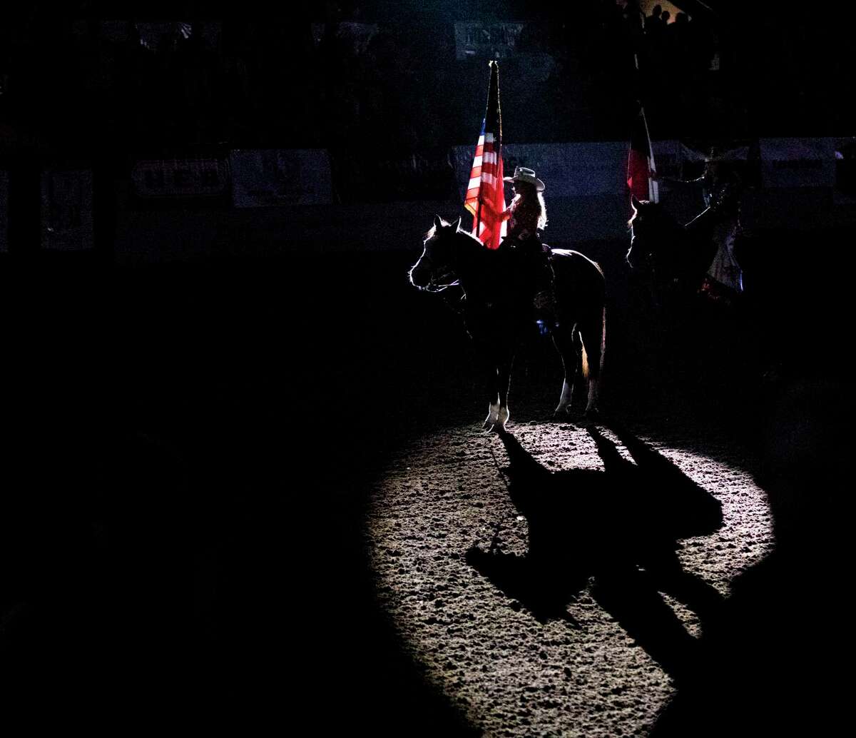 Jordan Maldonado presents the American flag during the national anthem last year at the Sandhills Rodeo in Ector County.