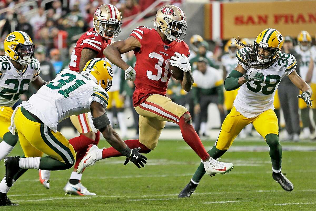 San Francisco 49ers running back Raheem Mostert (31) runs for a second quarter touchdown in the NFC Championship Game against the Green Bay Packers at Levi’s Stadium, Sunday, Jan. 19, 2020, in San Francisco, Calif. The San Francisco 49ers won 37-20 against the Green Bay Packers. The 49ers will play the Kansas City Chiefs in the Super Bowl.